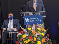 McConnell spoke at the University of Kentucky as Dr. Mark Newman, head of the hospital, listened.